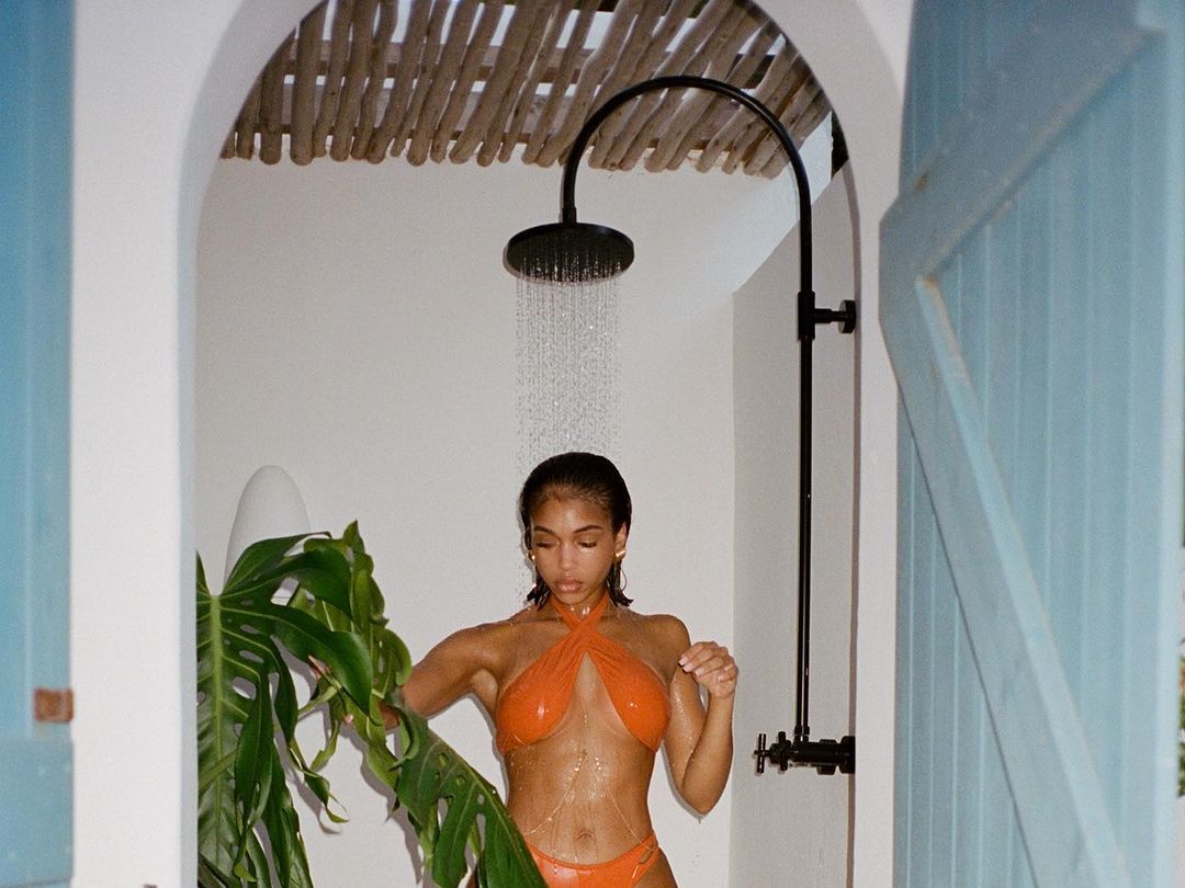 Ibiza Topless Beach Celebrities - Lori Harvey is a summer goddess in an orange wrap bikini