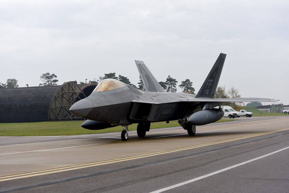 an f 22 raptor taxis on the taxiway at royal air force lakenheath, england, oct 19, 2017 six f 22 raptors transited through raf lakenheath us air force photoairman 1st class john a crawford