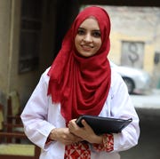 This is an image doctor saleema rehman visits the school that she attended as a child in attock pakistan during these visits, she helps to raise awareness of the importance of education