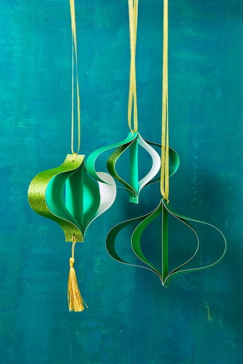 two diy christmas ornaments made of green 3d paper