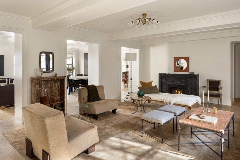 Living room featuring seating and decorative elements.