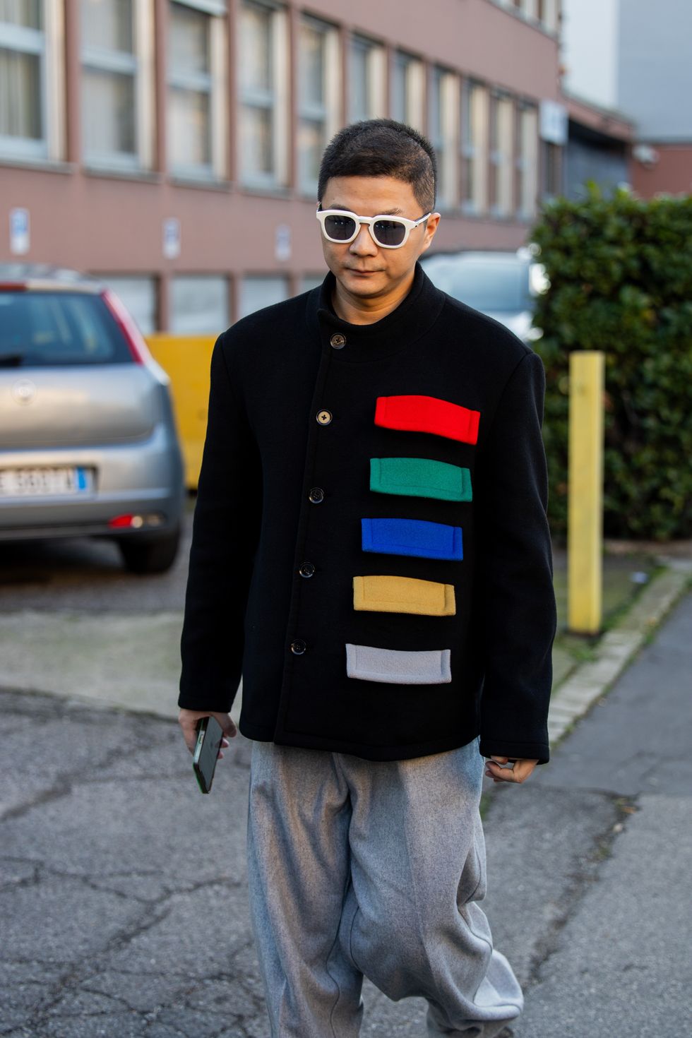milan, italy january 12 a guest wears jacket with colors outside gucci during the milan fashion week menswear fallwinter 2024 2025 on january 12, 2024 in milan, italy photo by christian vieriggetty images