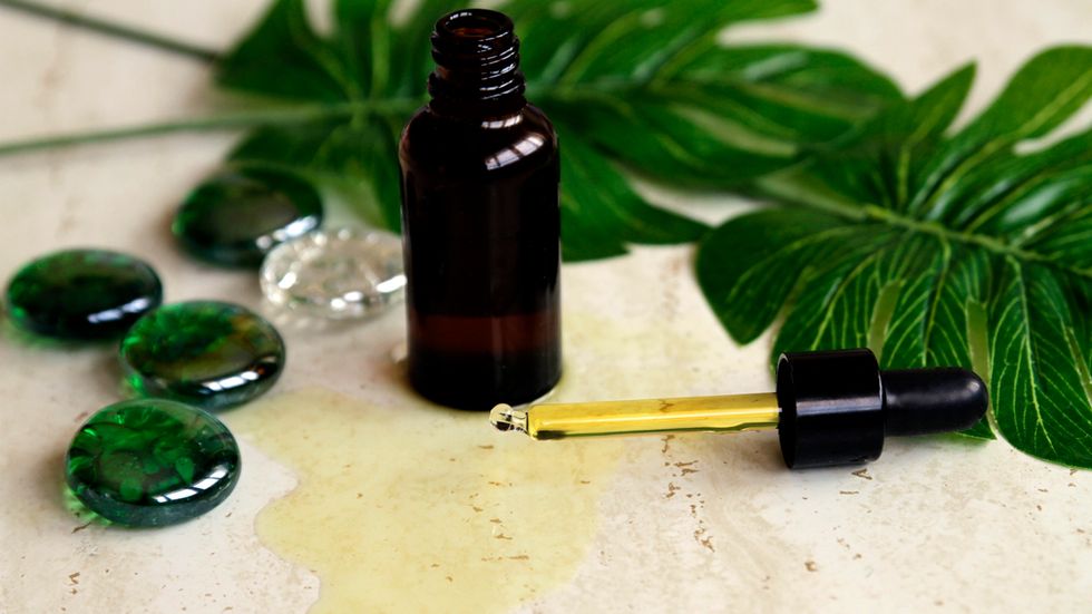 essential oils on marble background