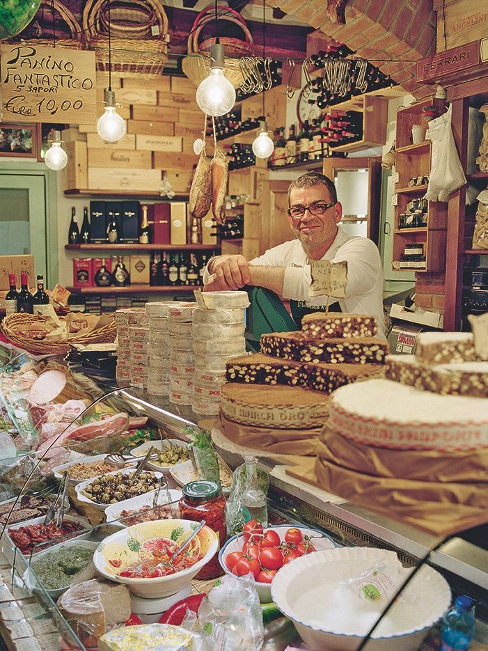 italy,tuscany,siena,portrait of food shop owner
