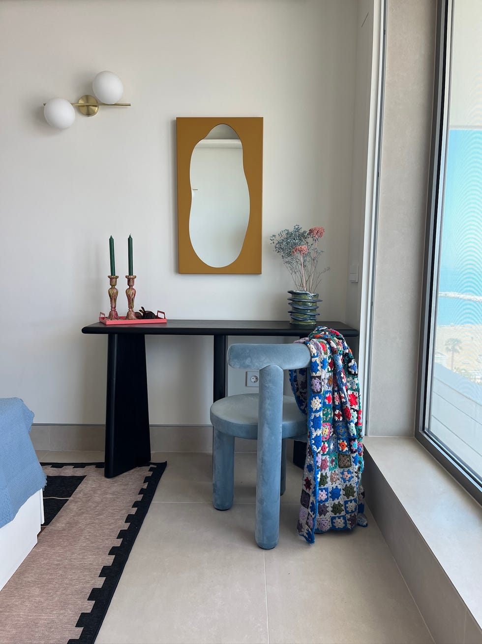 table chair and mirror in bedroom designed by micaela sharp