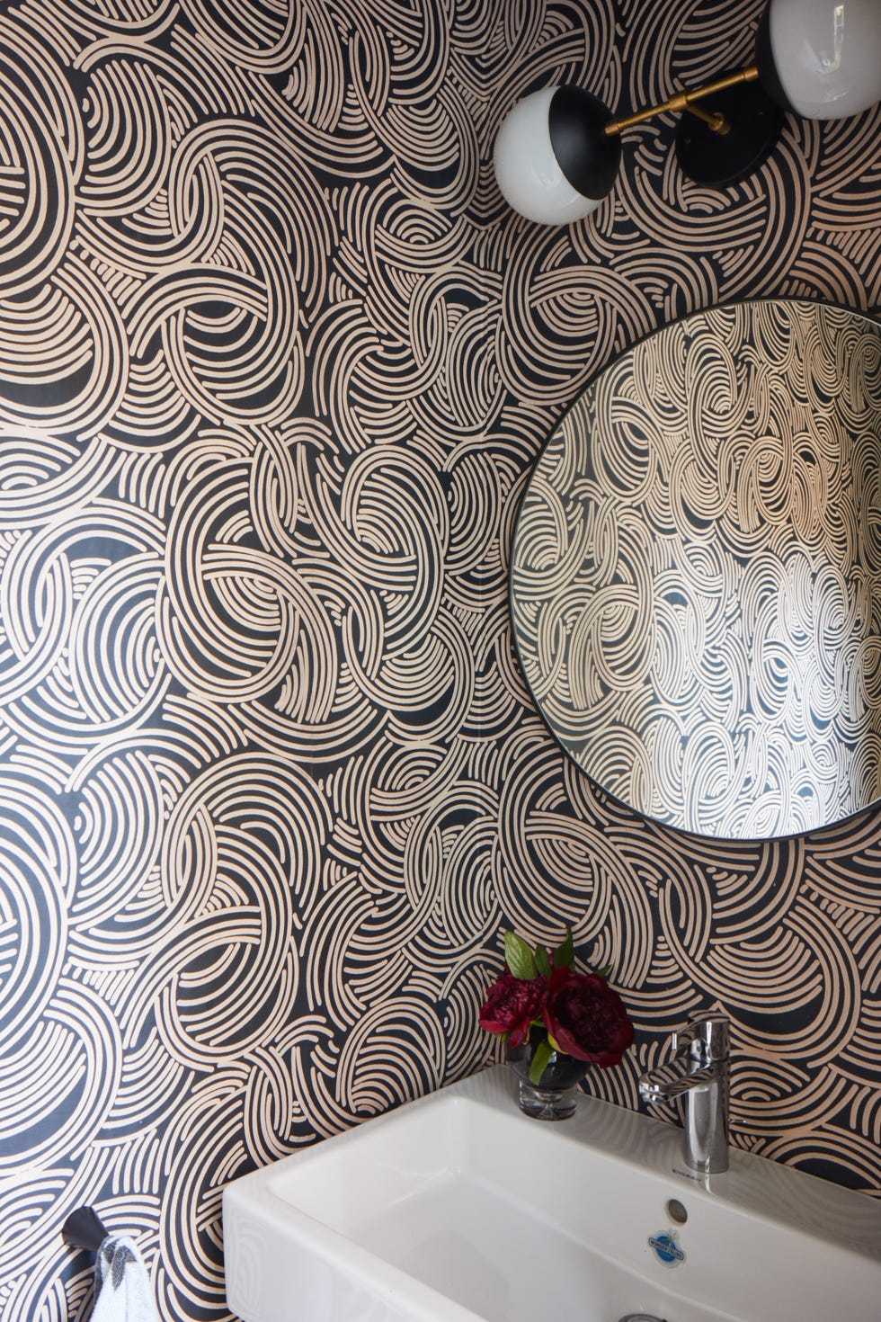 powder room with swirl wallpaper