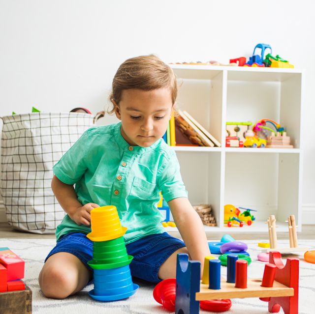 4 year old boy playing with building toys