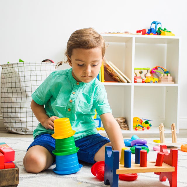 4 year old boy playing with building toys