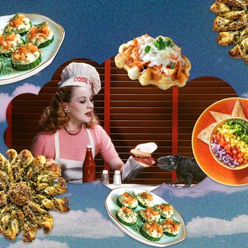 a woman sitting at a table with food on it