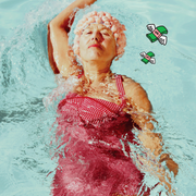 a woman swimming in a pool a woman swimming in a pool