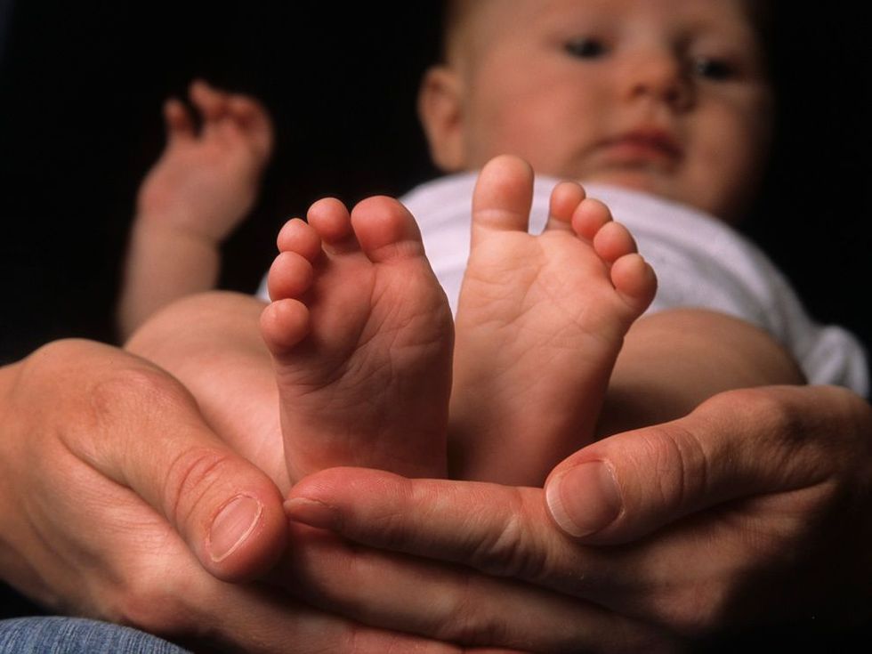 Ga op zoek naar details in closeup wanneer je fotos van een baby maakt Probeer dingen uit en vul het beeld met een handje voetje of haarlok