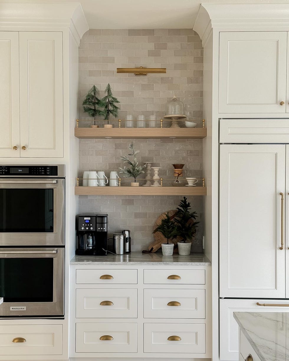 a kitchen with white cabinets a kitchen with white cabinets