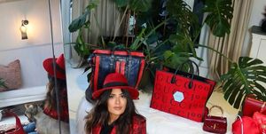 salma hayek surrounded by red items
