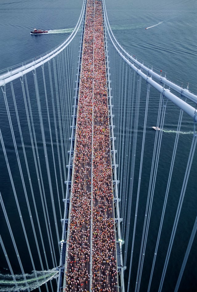 new york november 4 runners competing in the 1990 new york city marathon cross the verrazzano bridge from staten island to brooklyn near the beginning of the race on november 4, 1990 in new york, new york photo by david madisongetty images