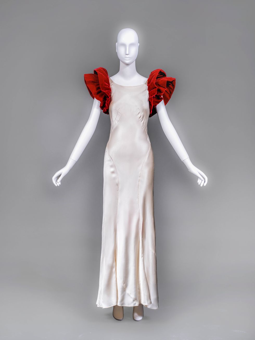 Chanel evening dress 1932, shown front and with capelet. Culture