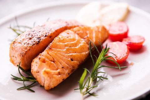 grilled salmon filet with green herbs
