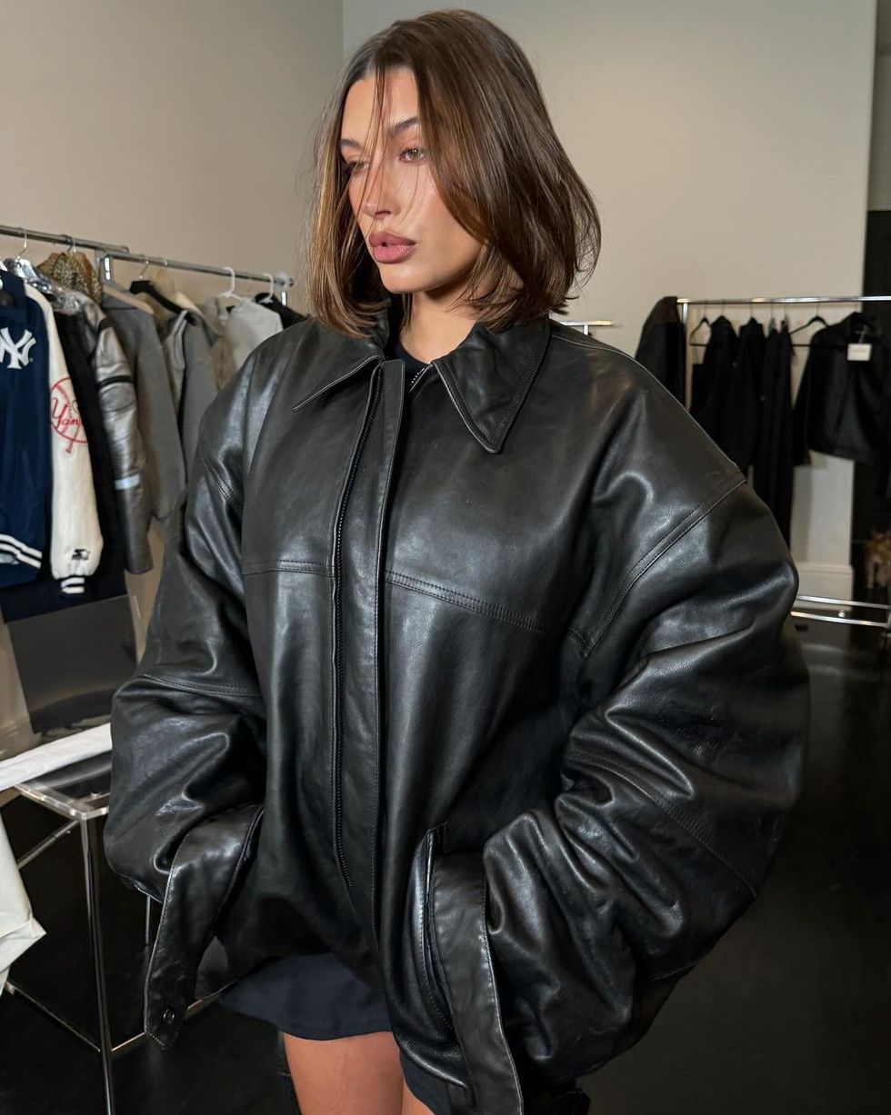 a person wearing a leather jacket