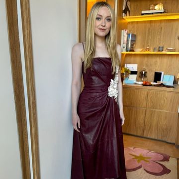 dakota fanning dress is fastened with florals