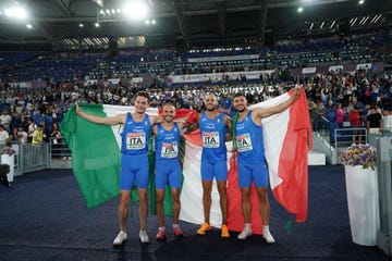 a group of athletes posing for a picture