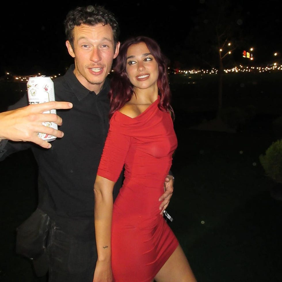 a man and woman posing for a picture