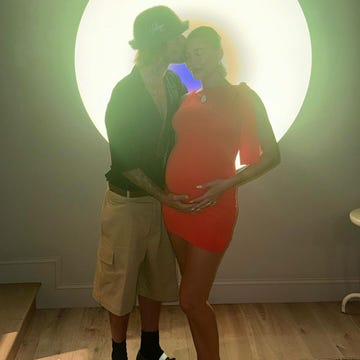 justin bieber kissing his pregnant wife hailey bieber in front of a james turrell art piece on august 3, 2024 justin bieber kissing his pregnant wife hailey bieber in front of a james turrell art piece on august 3, 2024