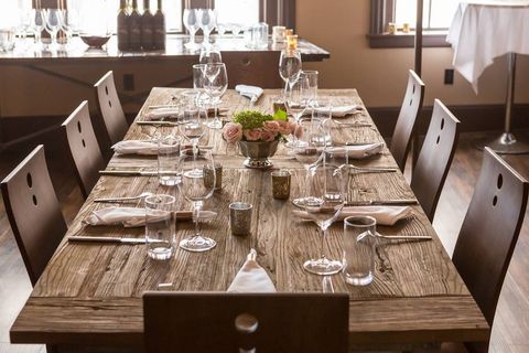 Restaurant, Table, Dining room, Furniture, Room, Tablecloth, Interior design, Rehearsal dinner, Textile, Wood, 