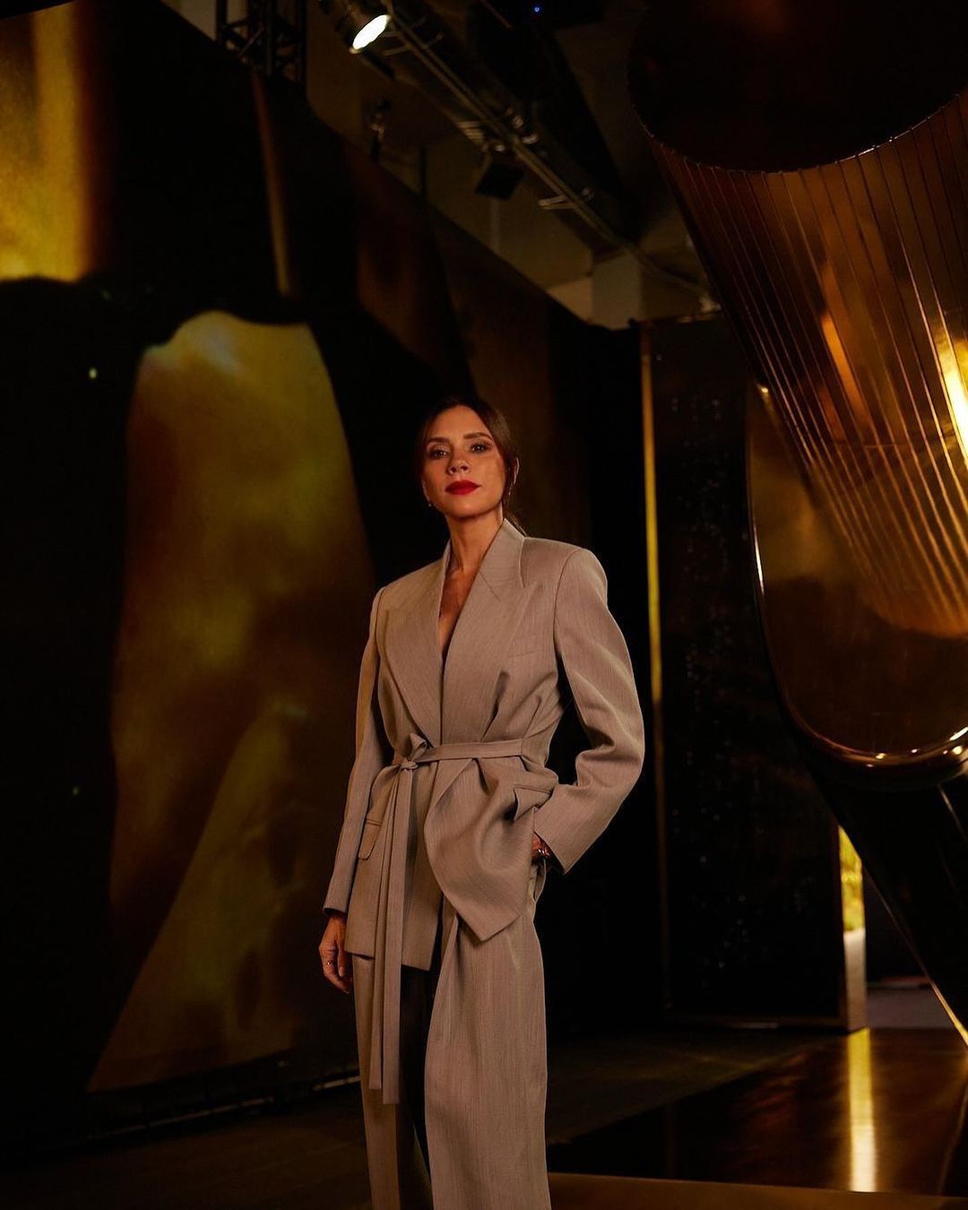 Victoria Beckham Models a Gray Suit From Her Sleek New