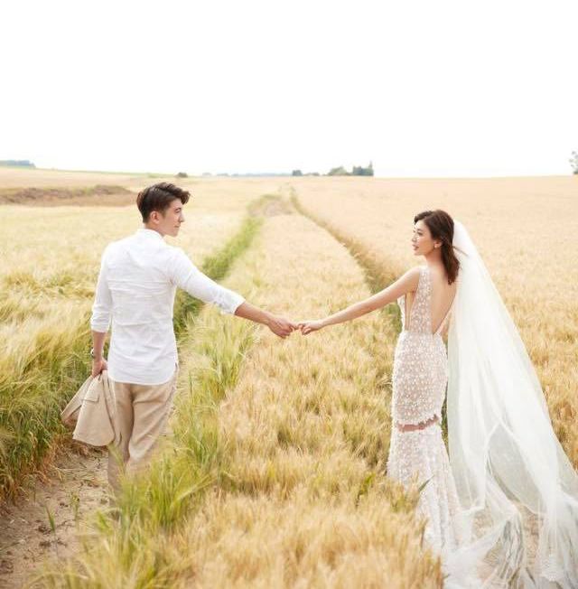 People in nature, Photograph, Wedding dress, Dress, Bride, Grass family, Interaction, Bridal clothing, Grassland, Grass, 