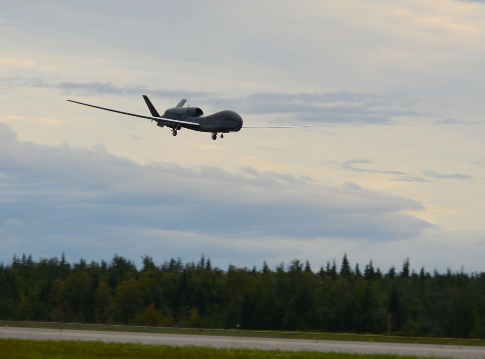 an rq 4 global hawk, assigned to the 12th reconnaissance squadron, lands during red flag alaska 18 3, aug 16, 2018, at eielson air force base, alaska this marks the first time an rq 4 has landed in alaska during the simulated combat training exerciseus air force photo by airman 1st class tristan d viglianco