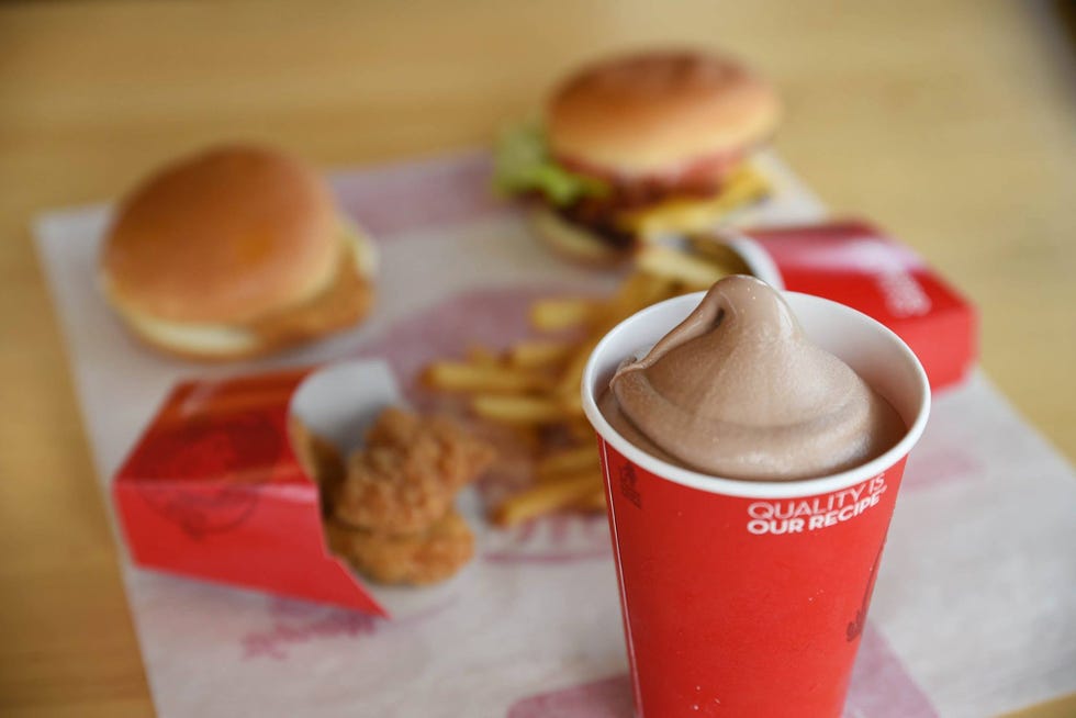 fast food meal with ice cream burgers chicken nuggets and fries