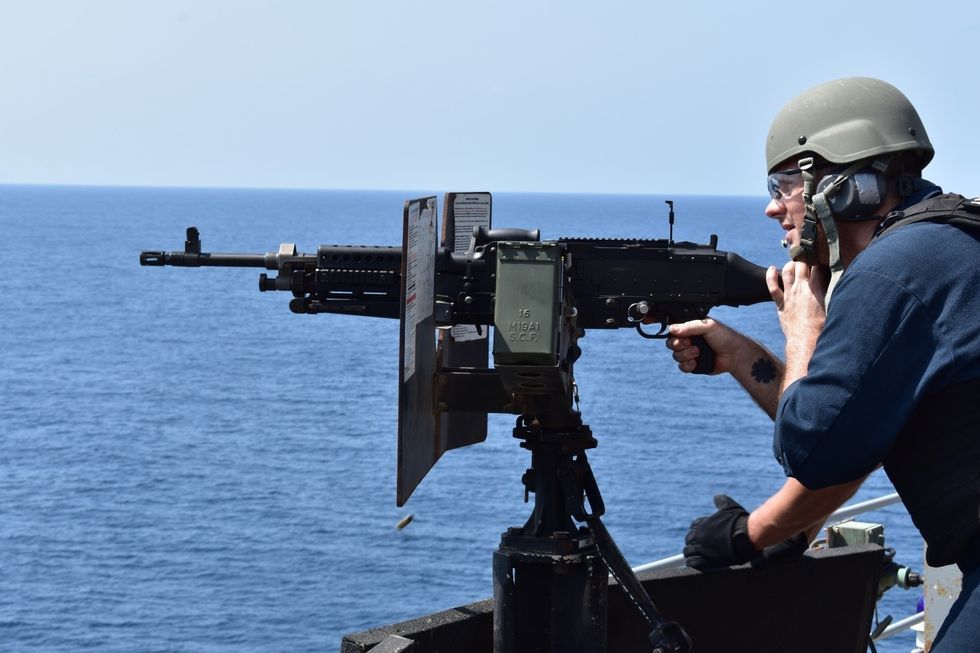 gulf of aden sept 22, 2018 electrician’s mate 2nd class robert creech conducts an m240 gun shoot aboard uss lewis b puller esb 3 the expeditionary sea base platform supports naval amphibious force, task force 51, 5th marine expeditionary brigade’s diverse missions that include crisis response, airborne mine countermeasures, counter piracy operations, maritime security operations and humanitarian aiddisaster relief missions while enabling tf 515 to extend its expeditionary presence in the world’s most volatile regions us navy photo by logistics specialist chief petty officer thomas joyce