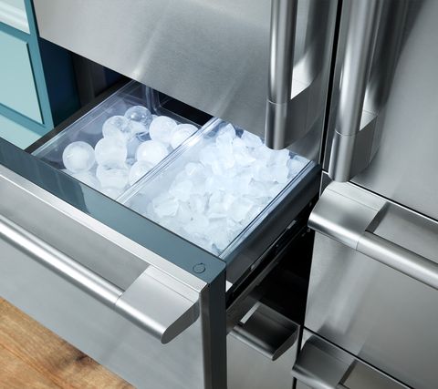 an ice drawer in a refrigerator
