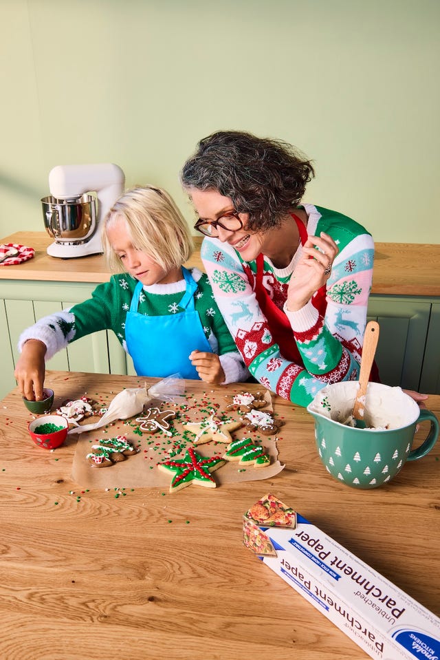 baking cookies decorated with icing and sprinkles