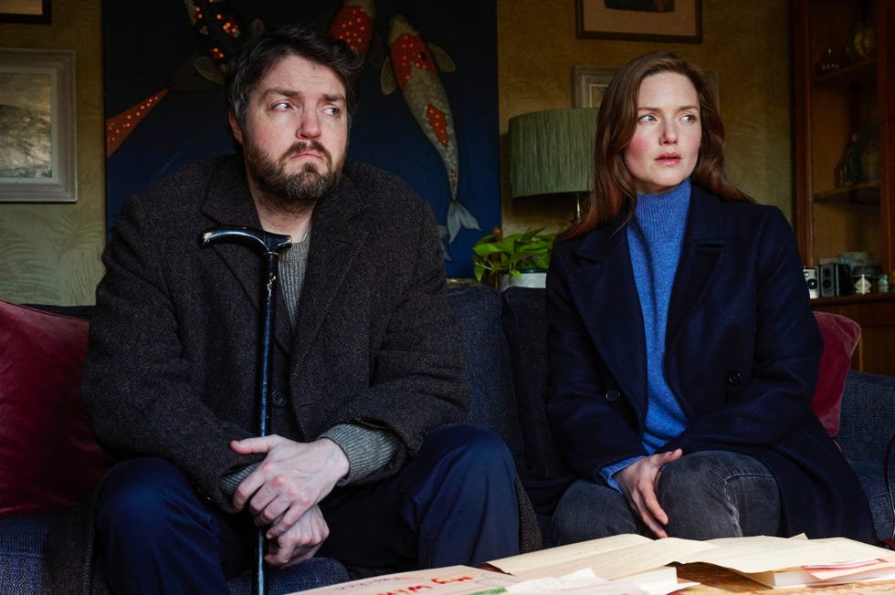 title:strike: the ink black heart,ep number:2,tx date:17 12 2024,tx week:51,embargoed until:05 12 2024 00:01:00,people:cormoran strike (tom burke);robin ellacott (holliday grainger),description:,copyright:bronte film  tv ,credit line:bbc/bronte film  tv/rob youngson