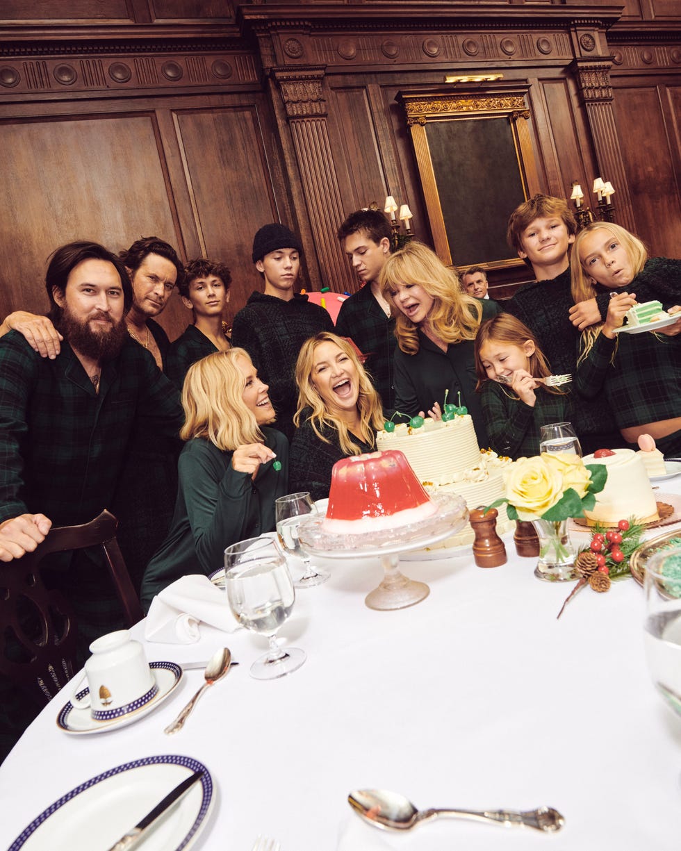 a group of people celebrating dessert at a festive table