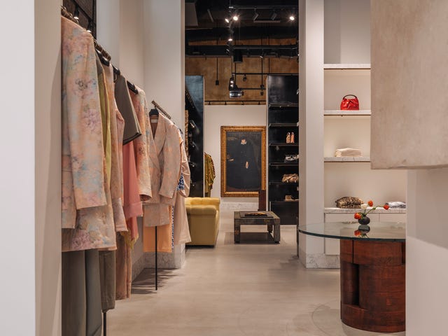 Clothing boutique interior featuring fashion items and decor