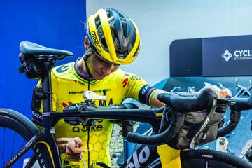 cyclist preparing a racing bike before an event