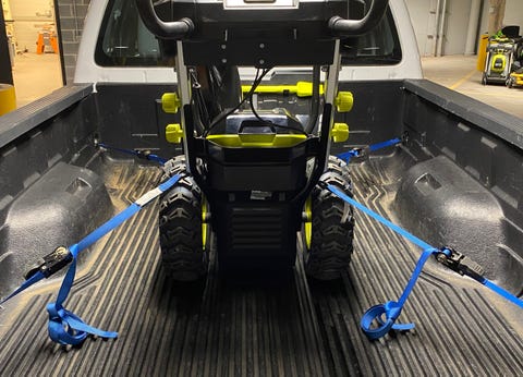 Ratchet straps for tying down the snow thrower