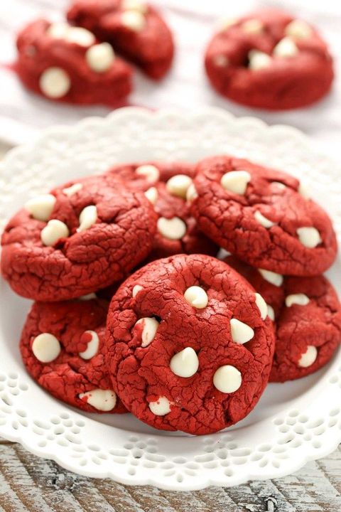 red velvet cake mix cookies with white chocolate chips on a white plate