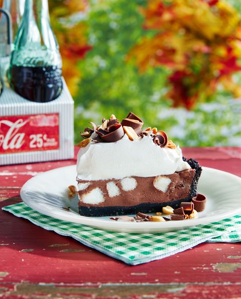 a slice of rocky road pie on a picnic table outside