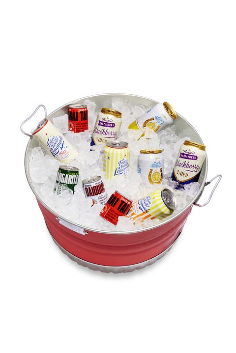 a red tub filled with ice and a variety of canned drinks