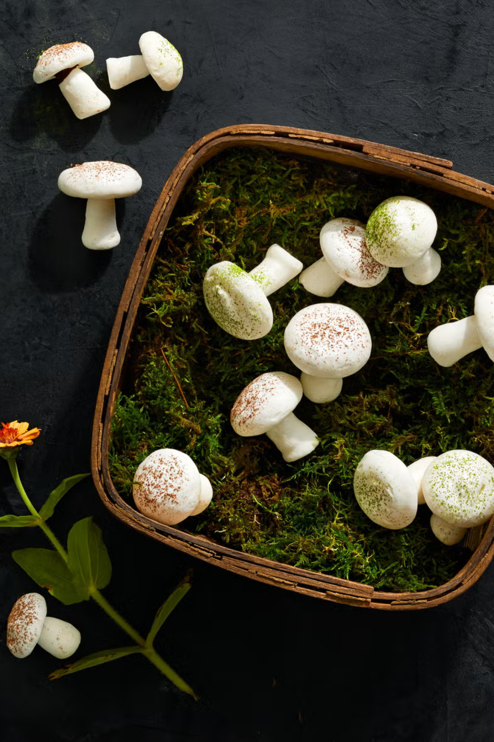 mushroom meringues in fake green moss