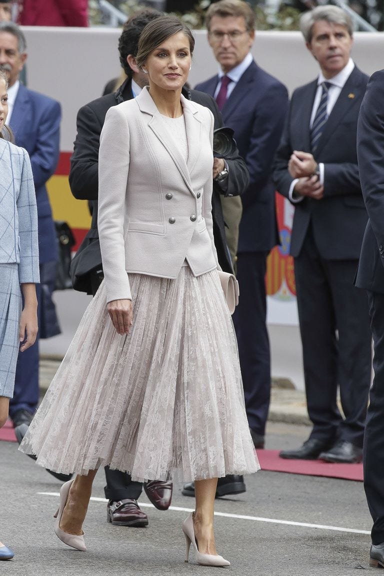 Clothing, Suit, Fashion, Dress, Hairstyle, Outerwear, Footwear, Street fashion, Event, Blazer, 