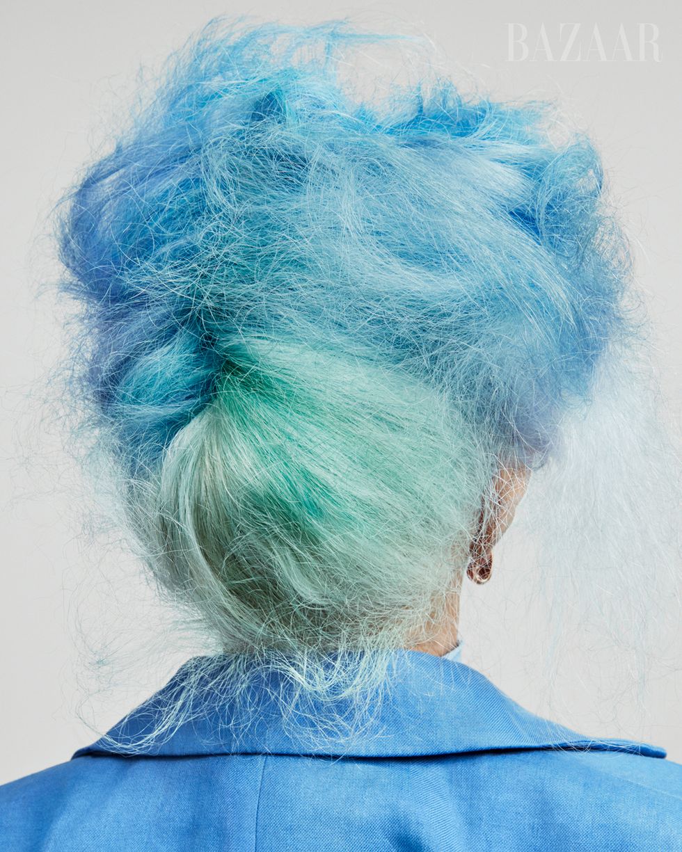 blue hair and blazer in bun away from camera