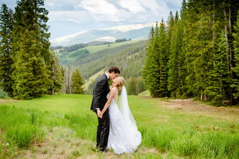 People in nature, Photograph, Bride, Wedding dress, Dress, Natural environment, Ceremony, Wedding, Wilderness, Bridal clothing, 