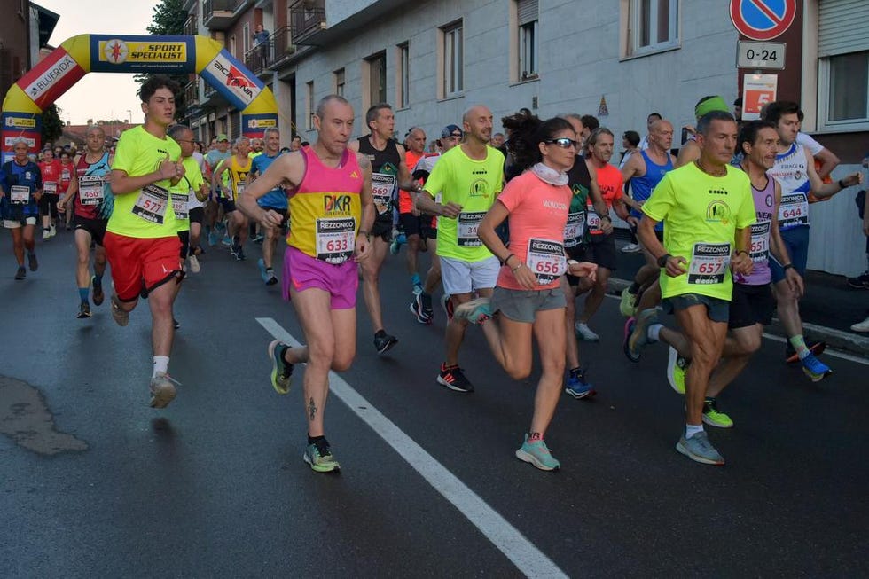 participants in a running event competing on a city street