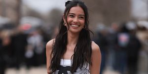 paris, france march 05 kelsey merritt seen wearing a black and white striped chanel top, black and red striped long skirt, black chanel ballerinas and a mini brown and black chanel handbag outside chanel show, during the womenswear fallwinter 20242025 as part of paris fashion week on march 05, 2024 in paris, france photo by jeremy moellergetty images