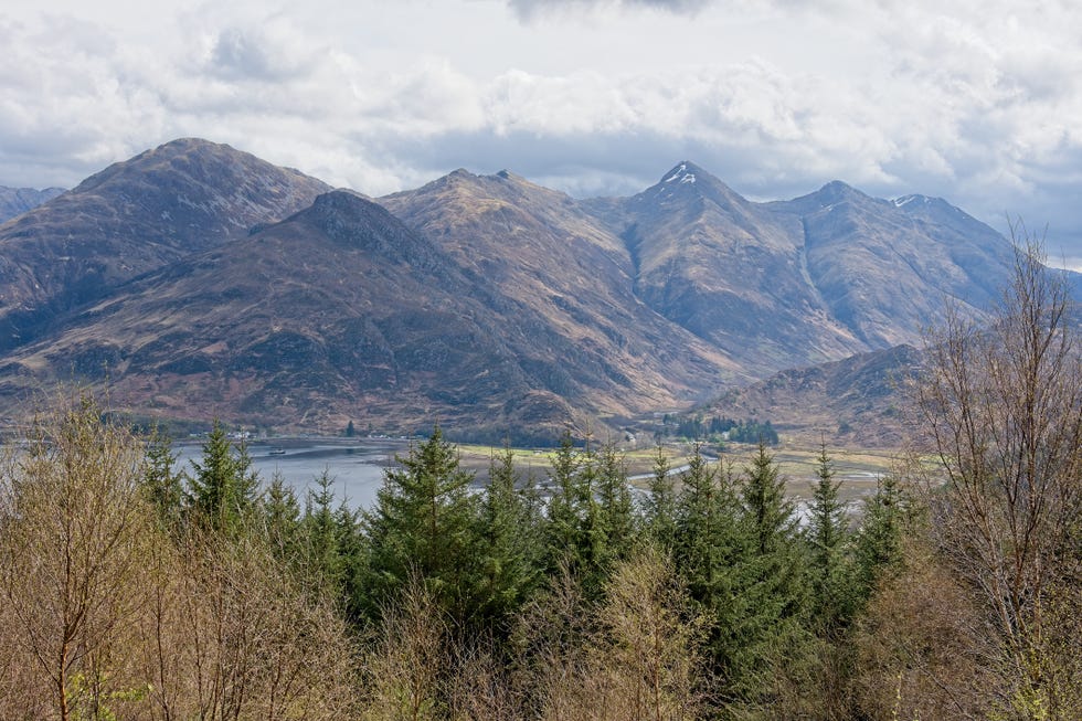 a beautiful view of the five sisters of kintail mountains in loch duich area, scottish highlands