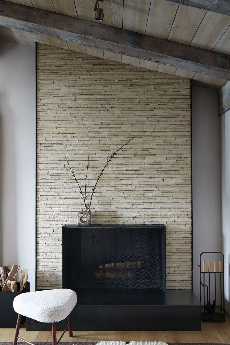 modern stacked stone fireplace