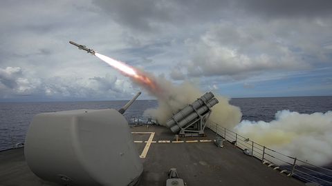 The Ticonderoga-class guided-missile cruiser USS Chancellorsville (CG 62) fires a Harpoon/Stand-Off Land Attack Missile on the fantail in support of Valiant Shield 2018